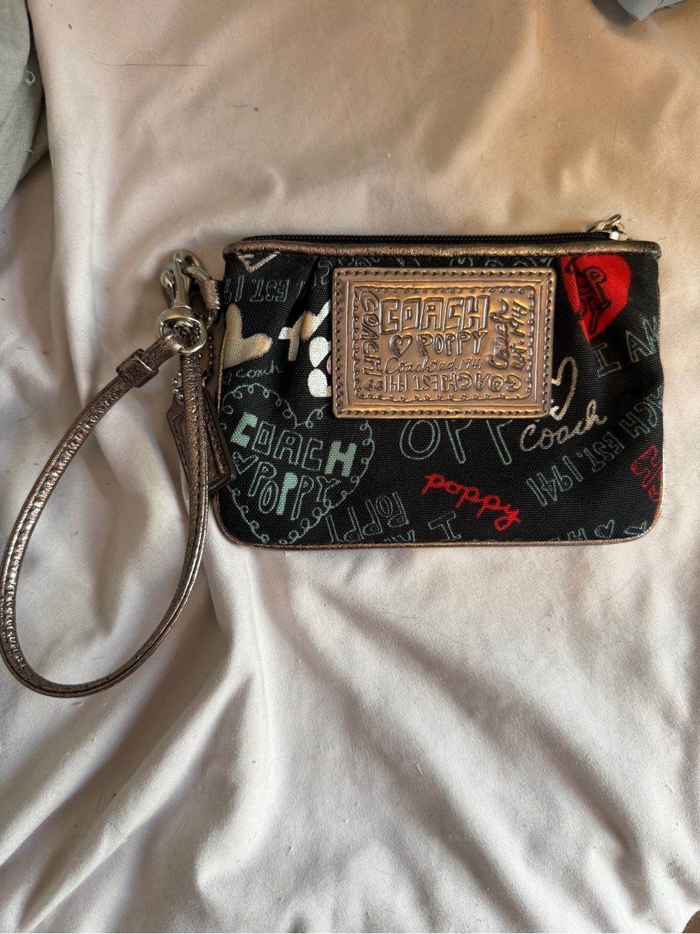 Coach Black Poppy Signature Wristlet with Metallic Bronze Trim
